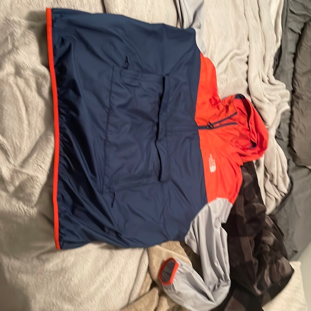 This is a very nice windbreaker coat to put over a sweater in the fall